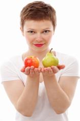 woman with apple and pear